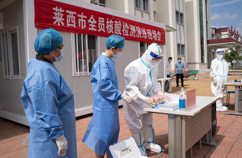 莱西市卫生健康局在夏格庄中心卫生院举办全员核酸检测演练现场会