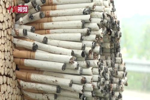 重庆：老人用1200根烟头制作成骷髅头像号召禁烟