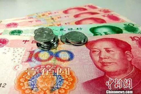 资料图：人民币。<a target='_blank' href='http://www.chinanews.com/' >中新网</a>记者 李金磊 摄 