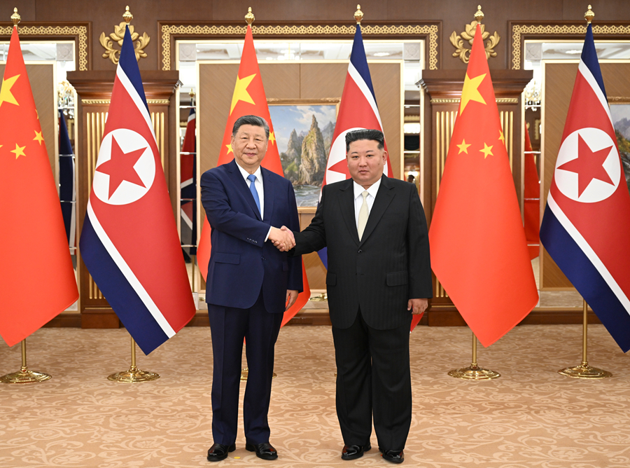 习近平同金正恩举行会谈