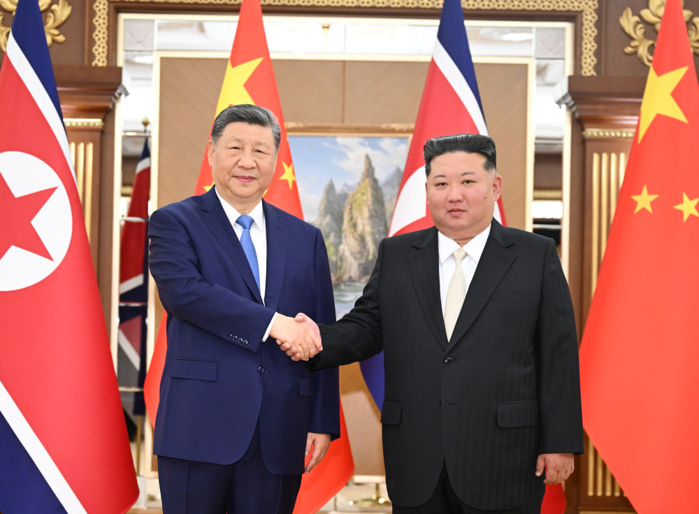 习近平同金正恩举行会谈