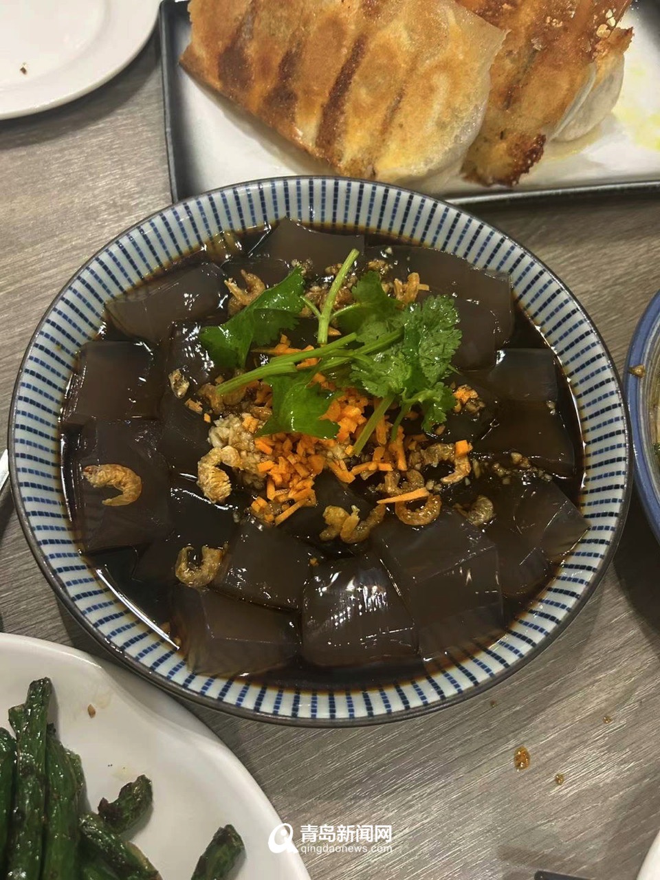 当青岛美食火到澳大利亚沙子口啤酒锅贴凉粉味道超正