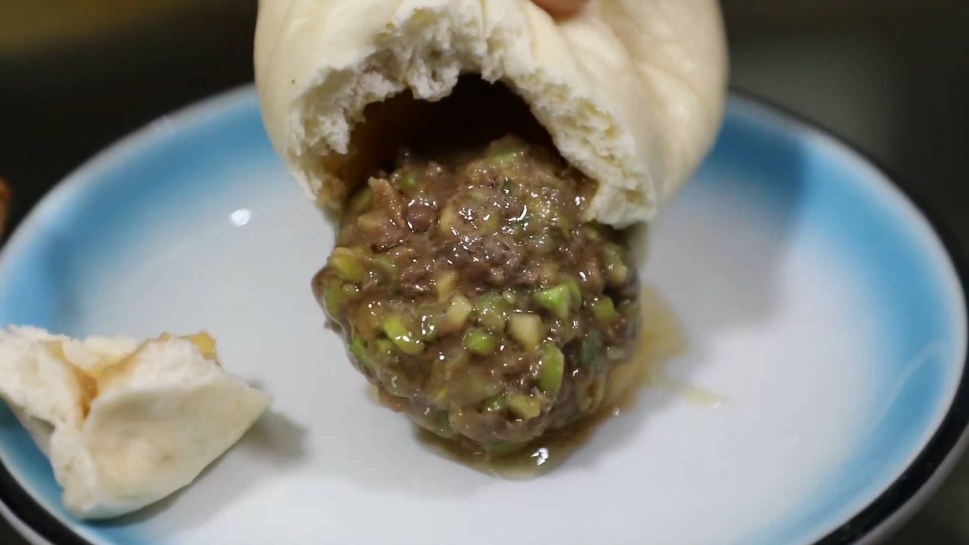 吃遍山东舌尖上的非遗宁津长官包子上捏三十二形似一朵花