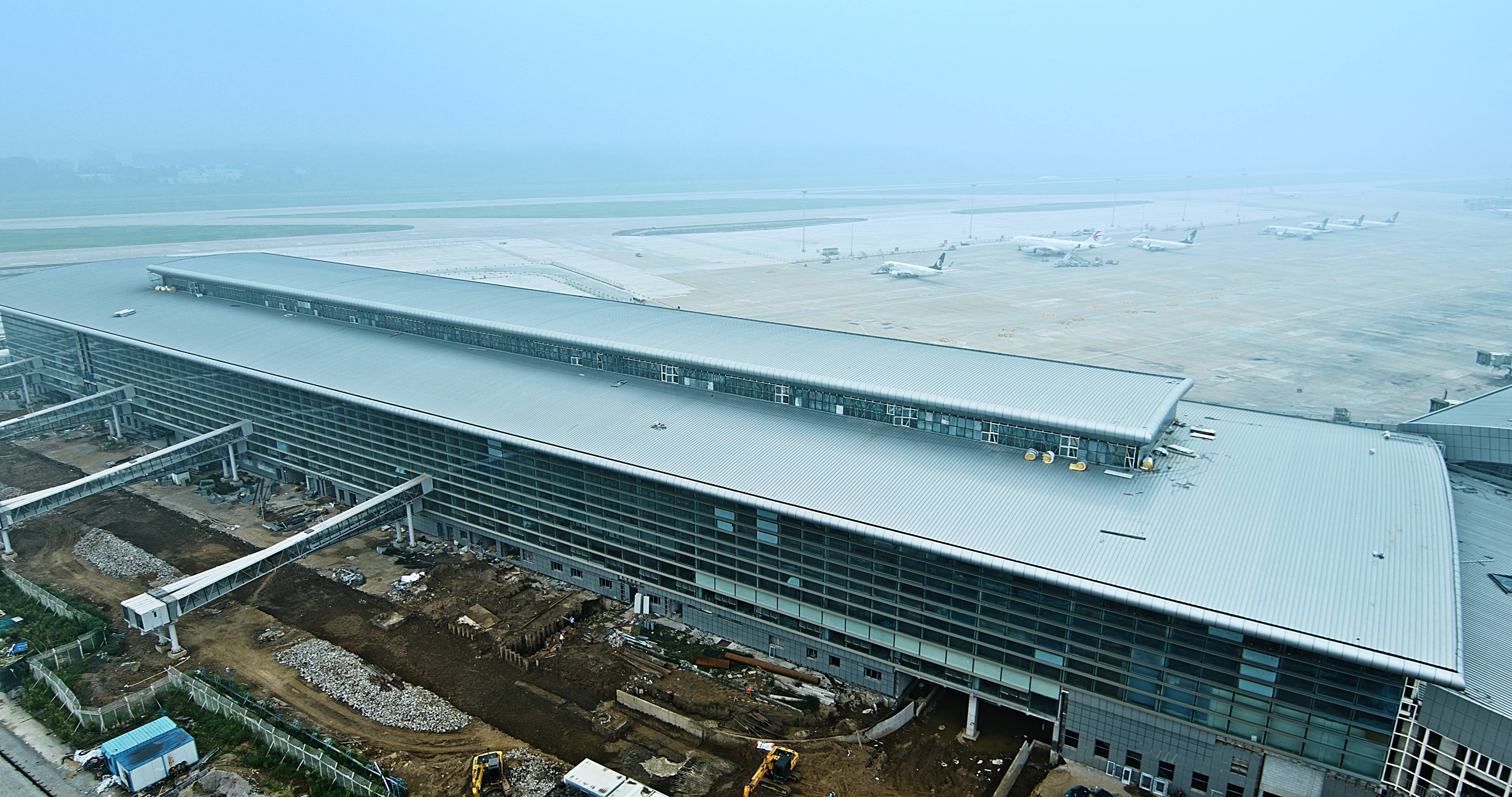 济南机场北指廊工程主体结构施工完成 计划今年底投入使用
