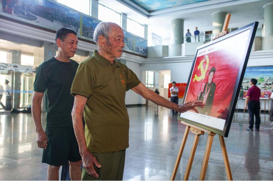 临沂市罗庄区举办“建党百年·致敬榜样”党员风采摄影展