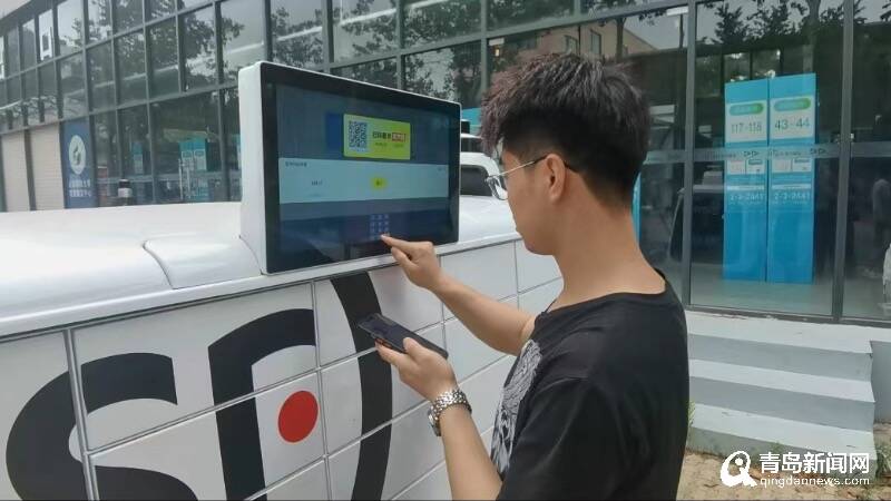 星空体育官方网站：“无人派件车”驶入岛城高校每天最多可送110件快递(图1)