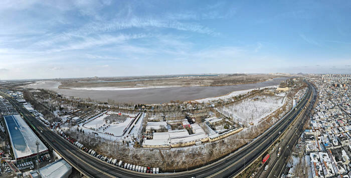 济南黄河映春雪 遥相呼应绘图景