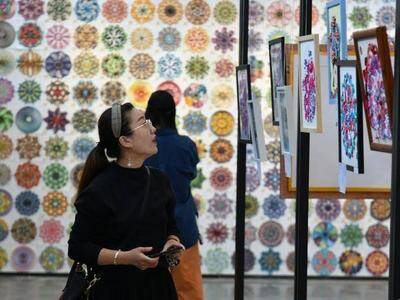 央媒看青岛 | 《人民日报》关注青岛百年纺织蝶变记