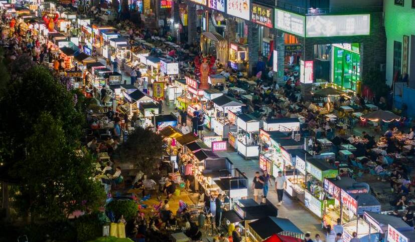 好评中国丨点亮城市夜色 激活夏日消费热潮